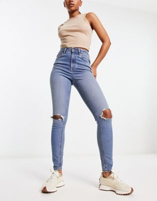 ASOS DESIGN ultimate skinny jean in mid blue with knee rips - ASOS Price Checker