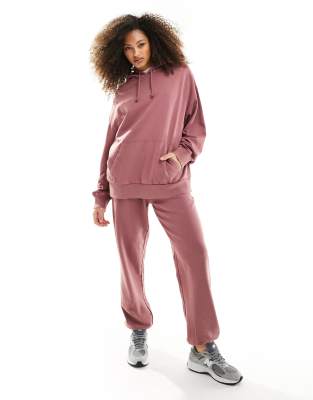 ASOS DESIGN - Ultimate - Jogginghose in verwaschenem Aubergine-Rosa