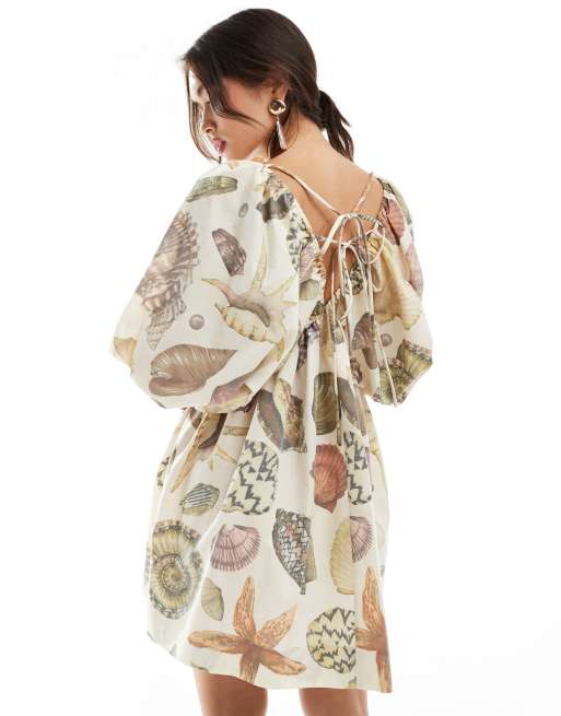 asos edition puff sleeve mini dress in printed sequin ASOS EDITION puff sleeve mini dress with pearls in ivory