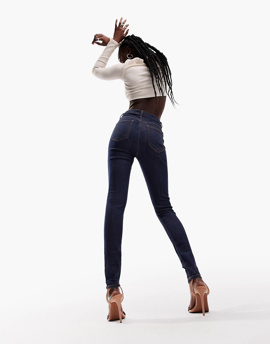 Asos Design Ultimate Skinny Jeans In Dark Blue