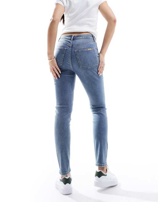 ASOS DESIGN ultimate skinny jeans in light blue with rips