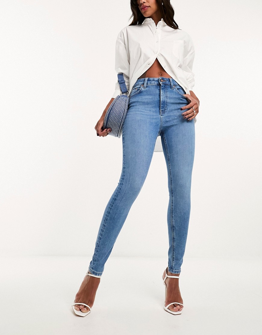 Asos Design Ultimate Skinny Jeans In Mid Blue