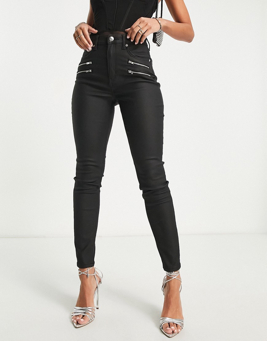 ASOS DESIGN ultimate skinny jeans with zips in coated black