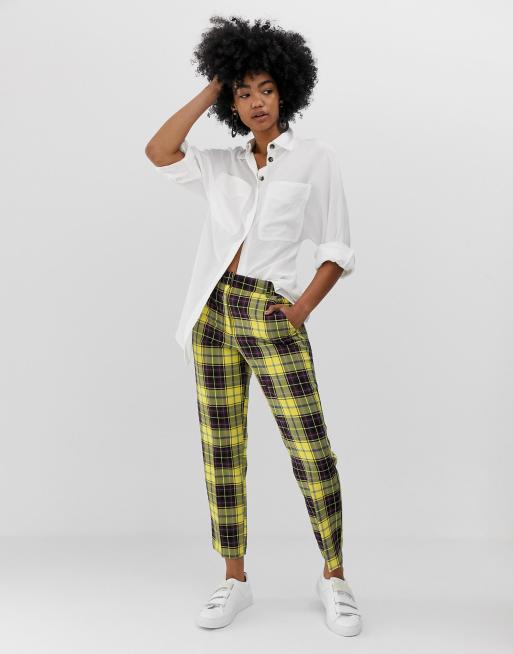 Yellow and store black check trousers