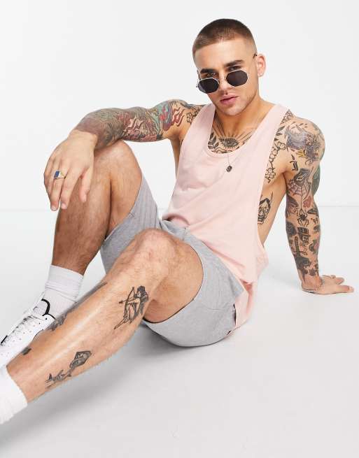 ASOS DESIGN - Undertrøje med ekstrem racerryg i forvasket lyserød