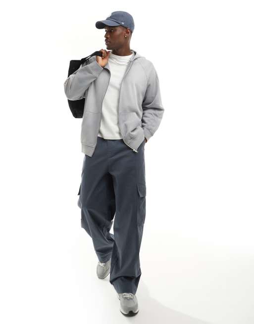 ASOS DESIGN - Uniseks oversized hoodie met rits en wassing in lichtblauw