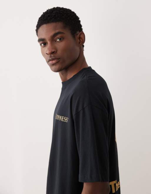 ASOS DESIGN - Uniseks oversized T-shirt met Guiness-print in zwart, 4 van 5
