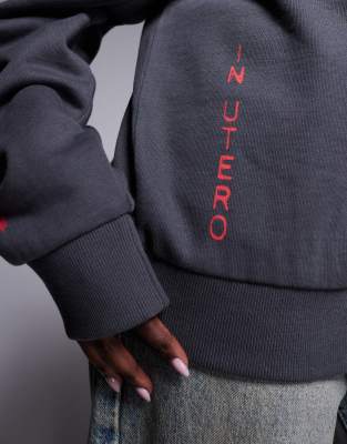 ASOS DESIGN unisex boxy oversized license sweatshirt with Nirvana