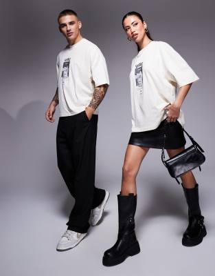 ASOS DESIGN unisex boxy oversized Pokemon t-shirt with Pokemon Pikachu prints and embroidery in beige