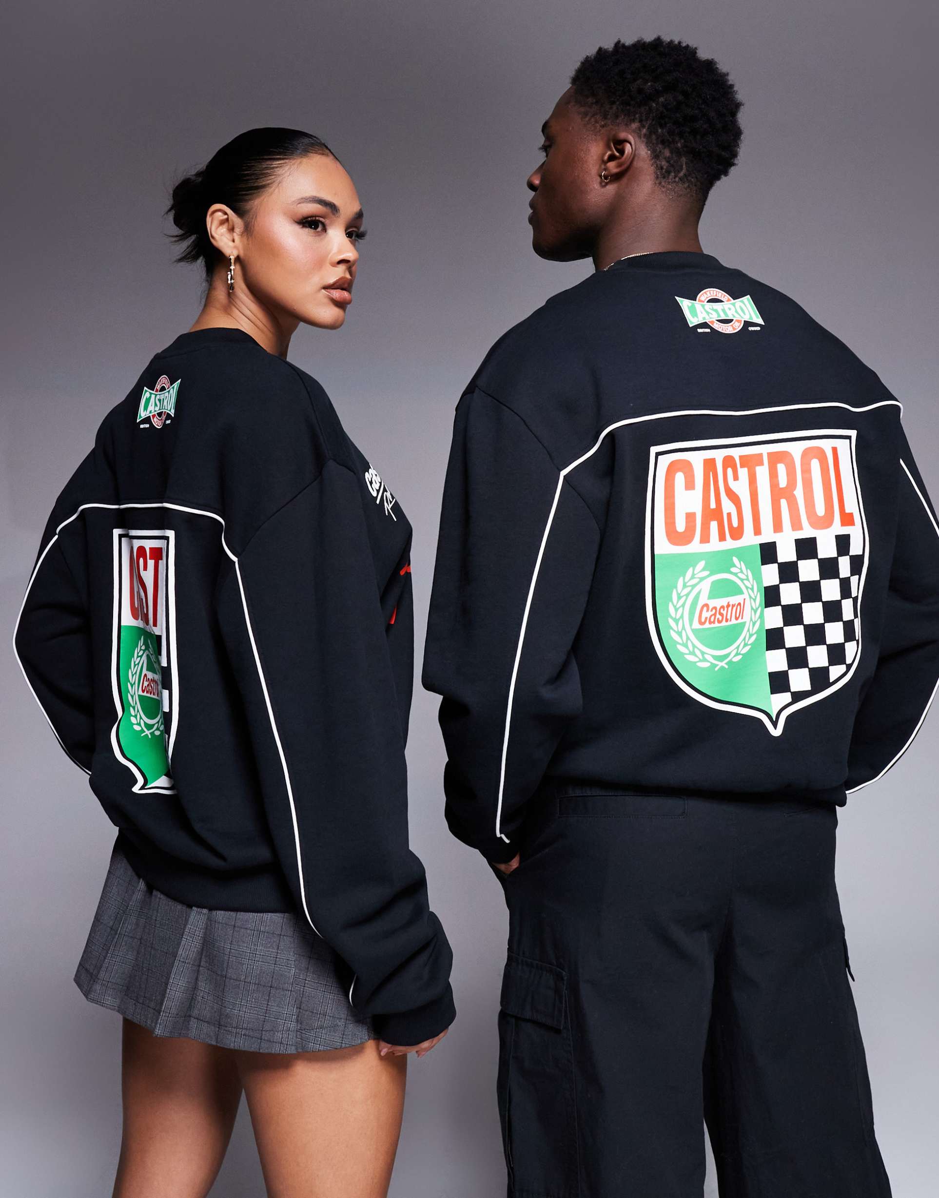 asos design unisex boxy oversized sweatshirt with piping detail and castrol racing prints in black