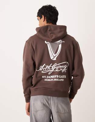 Unisex-Kapuzenpullover in Braun mit „Guinness"-Print und Oversize-Schnitt-Brown Brown XS