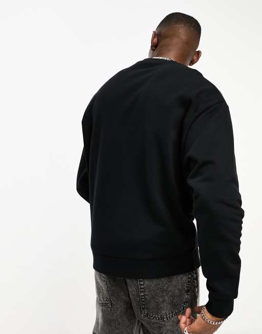 ASOS DESIGN unisex licence oversized sweatshirt with Def Leppard World Tour graphic in black, 4 of 4