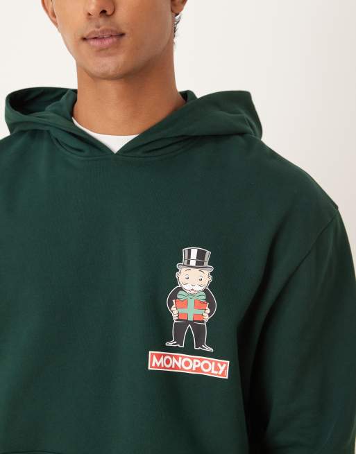 ASOS DESIGN unisex oversized hoodie with Christmas Monopoly print in green, 4 of 4
