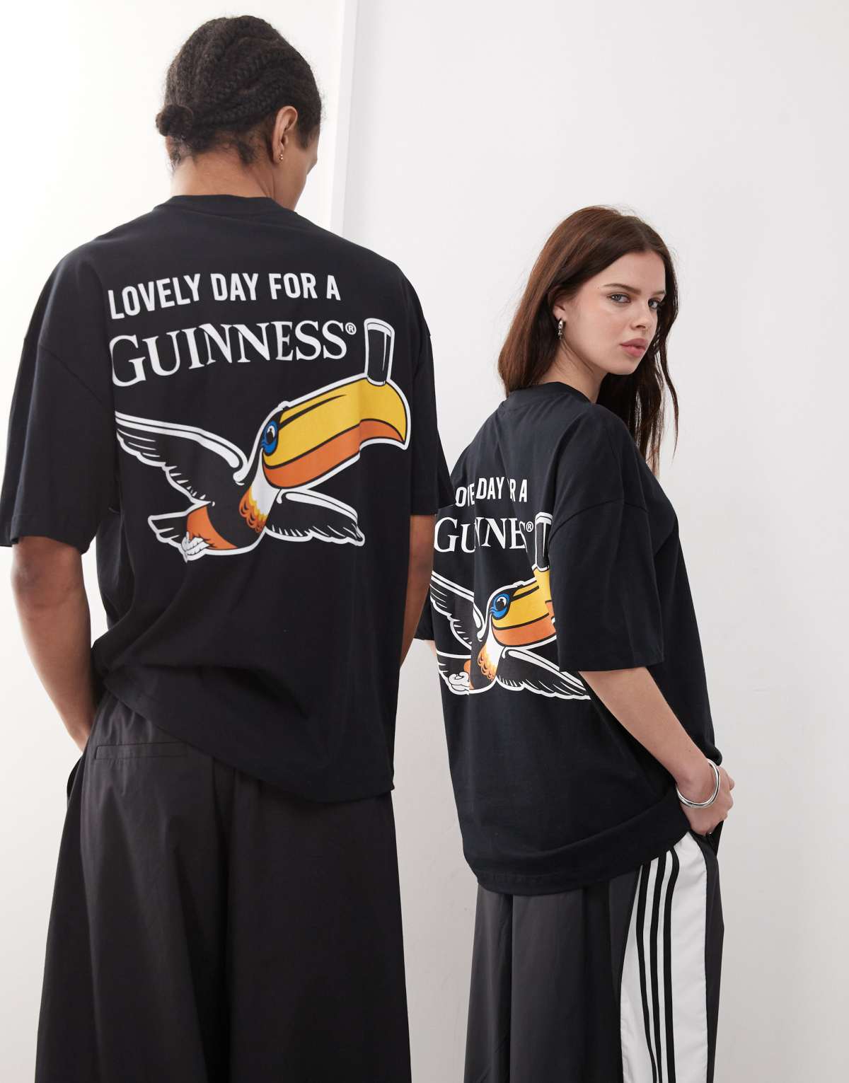 ASOS DESIGN unisex oversized license t-shirt with Guinness prints in black