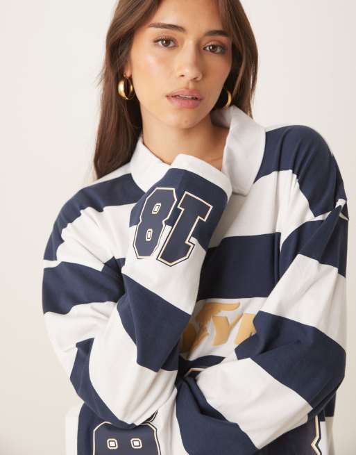 ASOS DESIGN - Unisex - Oversized poloskjorte med lange ærmer, 'Goodyear'-print og blå/hvide striber, 2 af 4