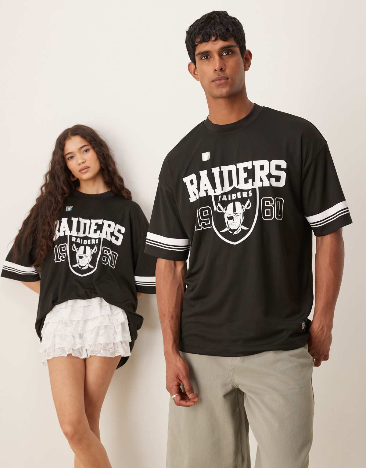 ASOS DESIGN unisex oversized sports t-shirt with NFL Raiders prints in black