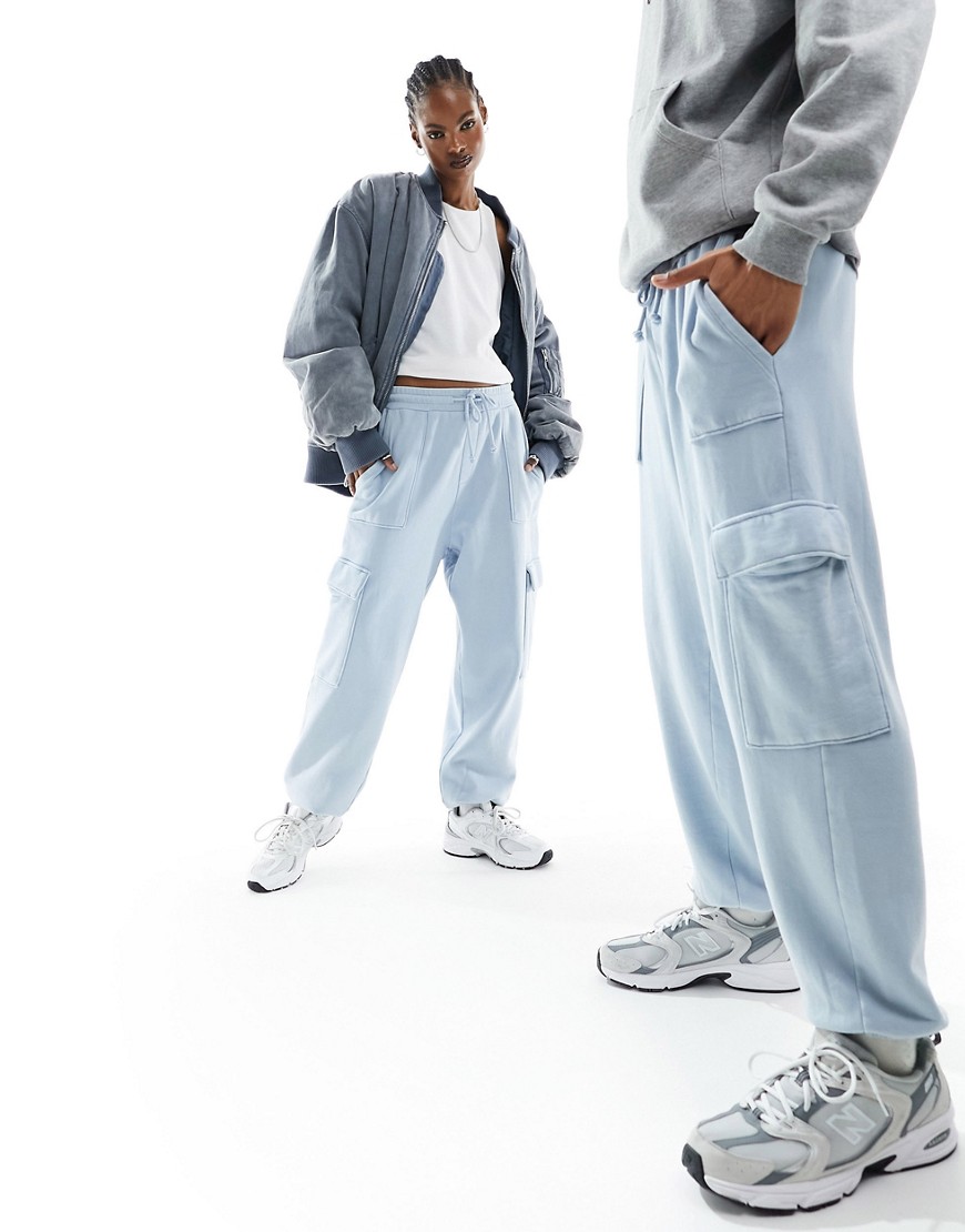 unisex oversized sweatpants with cargo pockets in washed blue