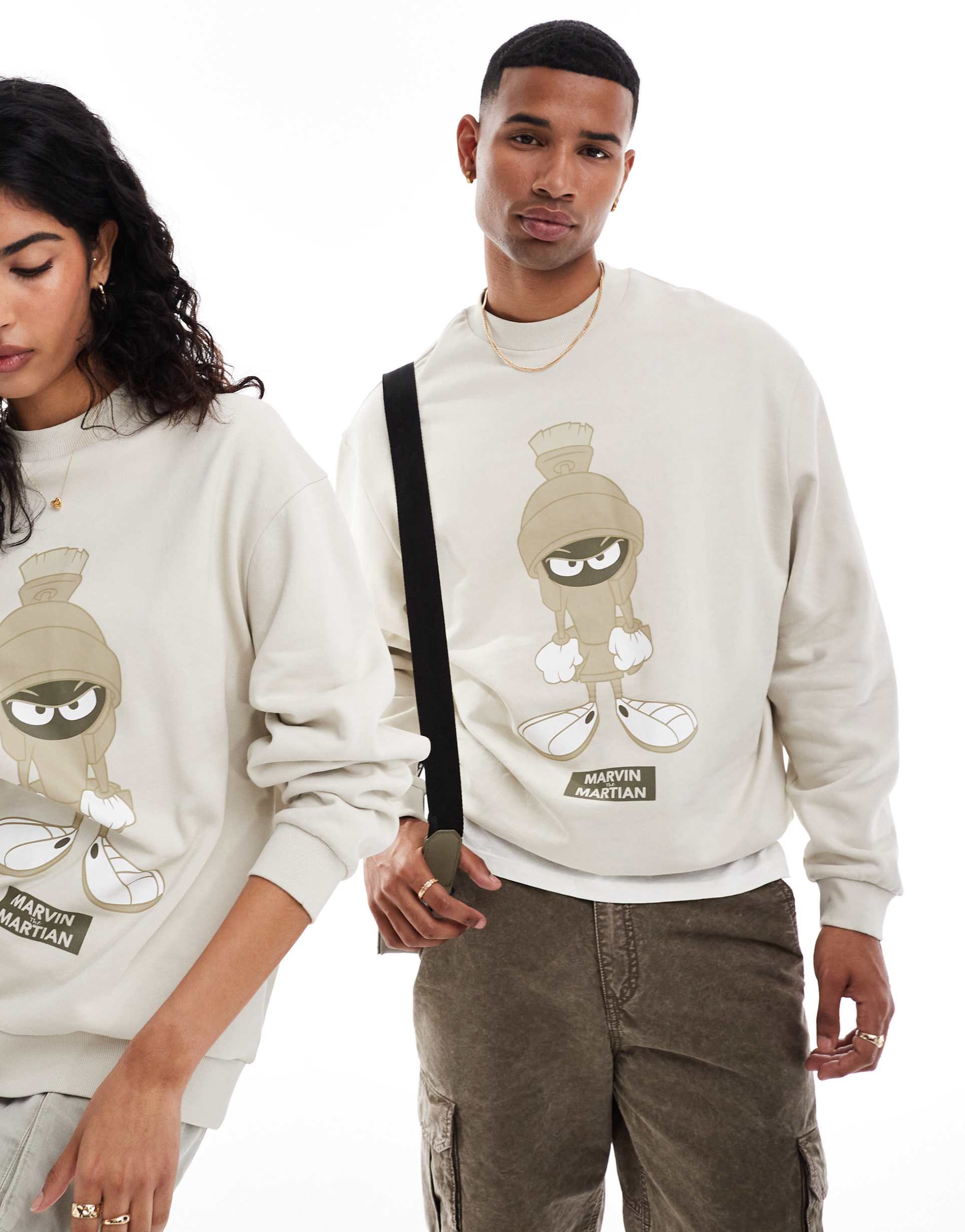 asos design unisex oversized sweatshirt with looney tunes marvin the martian print in stone