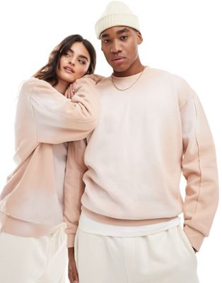 ASOS DESIGN unisex oversized sweatshirt with seam detail in washed pink