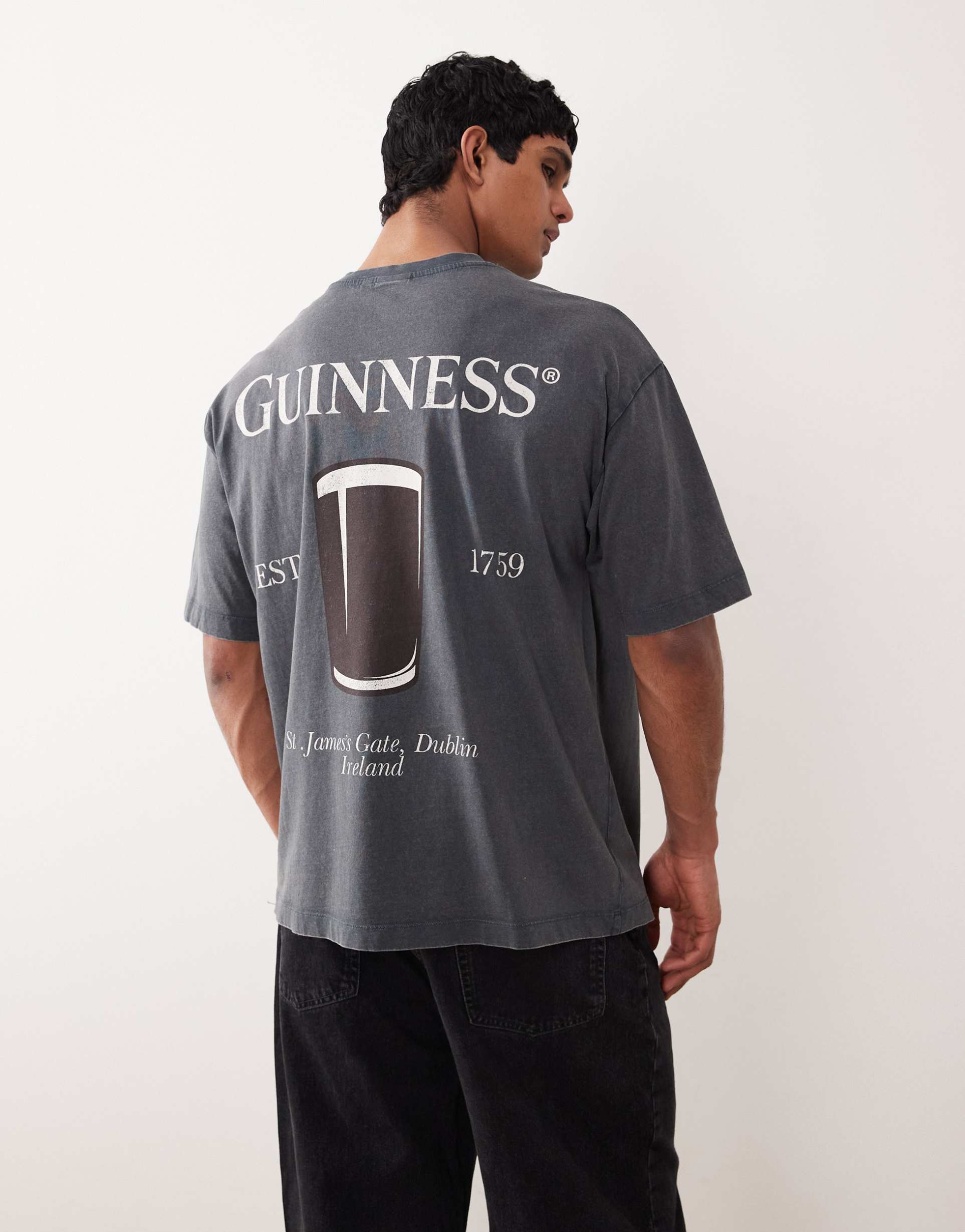asos design unisex oversized t-shirt with guinness prints in washed black