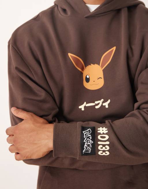 ASOS DESIGN unisex Relaxed hoodie with Pokemon print in brown, 2 of 4
