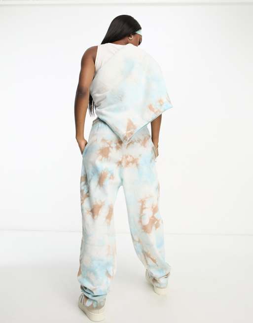 ASOS DESIGN unisex relaxed sweatpants in blue tie dye part of a set