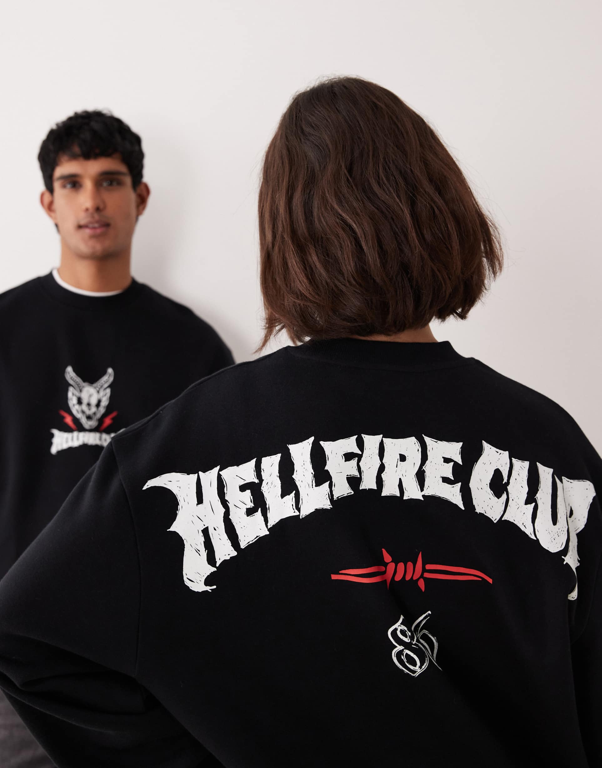 asos design unisex relaxed sweatshirt with stranger things in black