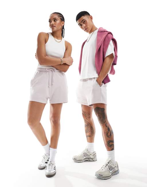 ASOS DESIGN unisex shorter length slim shorts in washed lilac