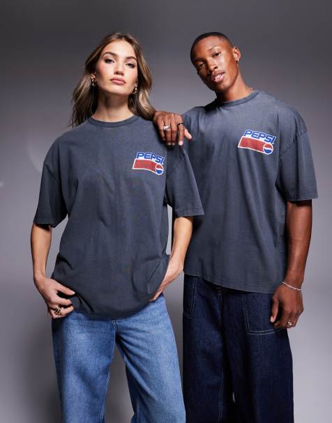 ASOS DESIGN – Unisex-T-Shirt in verwaschenem Schwarz mit Oversize-Schnitt und lizenzierten „Pepsi“-Prints - view 1