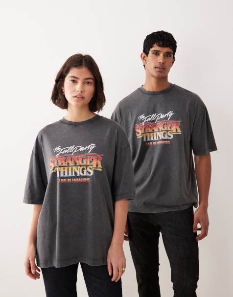 ASOS DESIGN – Unisex-T-Shirt in verwaschenem Schwarz mit Oversize-Schnitt und „Stranger Things“-Retroprint - view 1