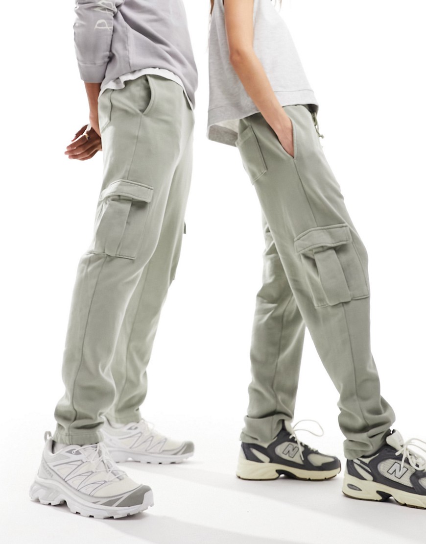 ASOS DESIGN unisex tapered joggers with cargo pockets in washed green