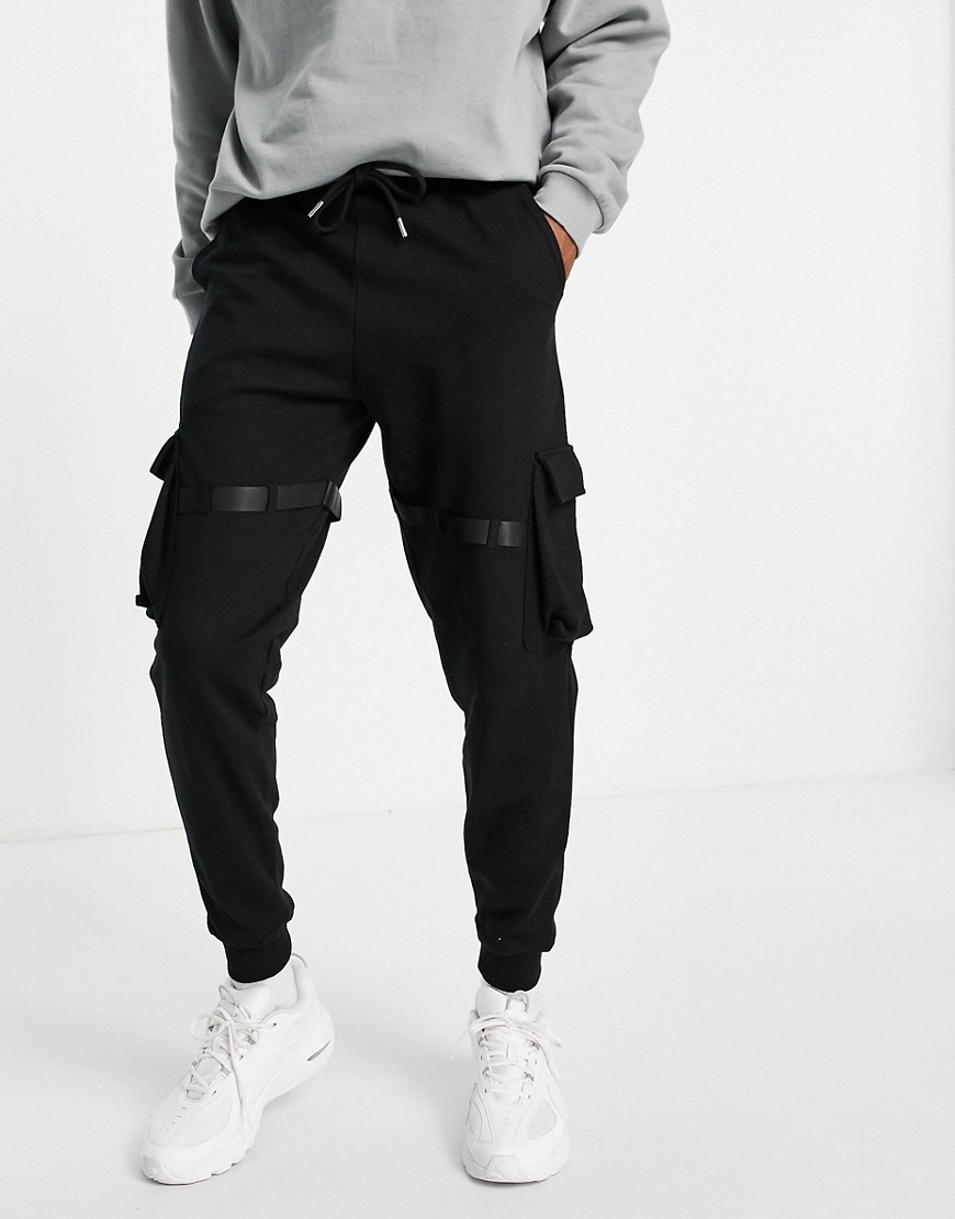 ASOS DESIGN utility cargo sweatpants with multi pockets & strapping-Black