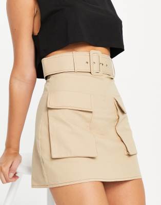 Utility seat belt outlet skirt