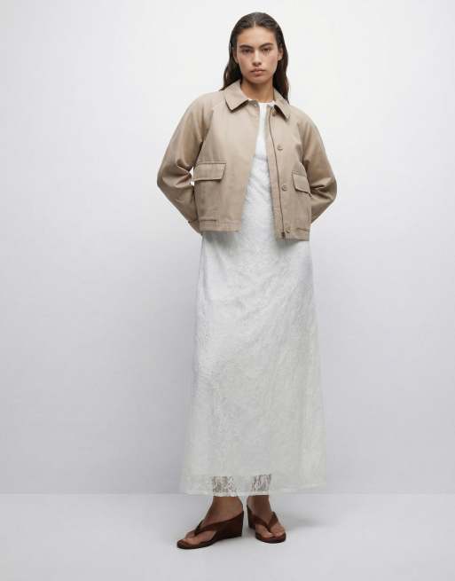 ASOS DESIGN utility pocket short cape back trench with cotton and water repellent finish in light stone, 8 of 11