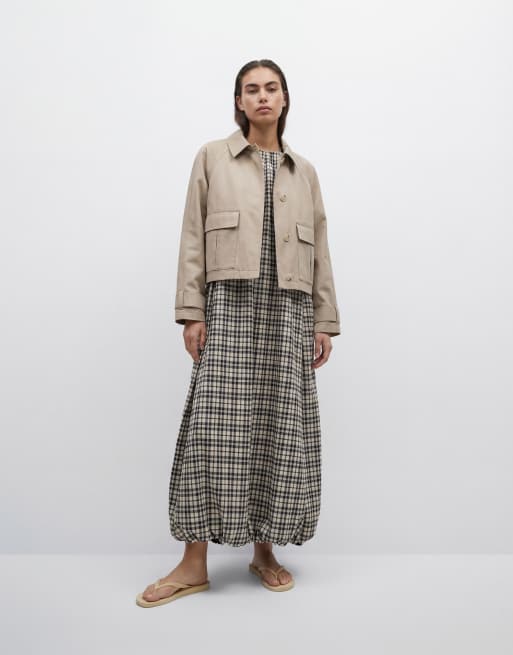 ASOS DESIGN utility pocket short cape back trench with cotton and water repellent finish in light stone, 9 of 11