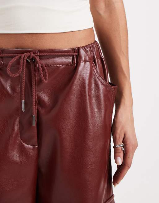 ASOS DESIGN utility trousers in faux leather in burgundy , 2 of 5