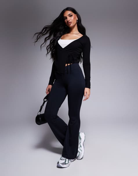 ASOS DESIGN v front cross over flare leggings in black - view 1