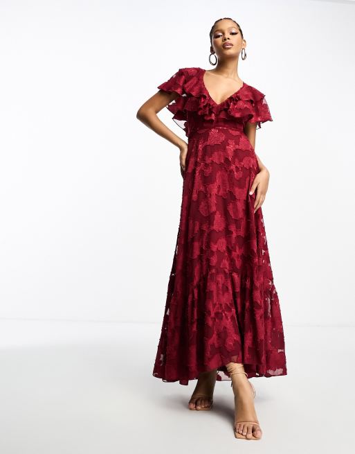 ASOS DESIGN v front v back ruffle maxi dress with flutter sleeve and tie  back in textured jacquard in burgundy