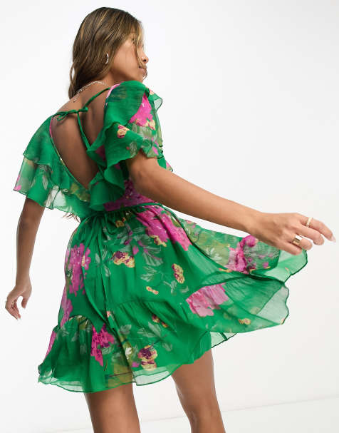 ASOS DESIGN v front v back ruffle mini dress with flutter sleeve and tie belt in green floral print - view 1