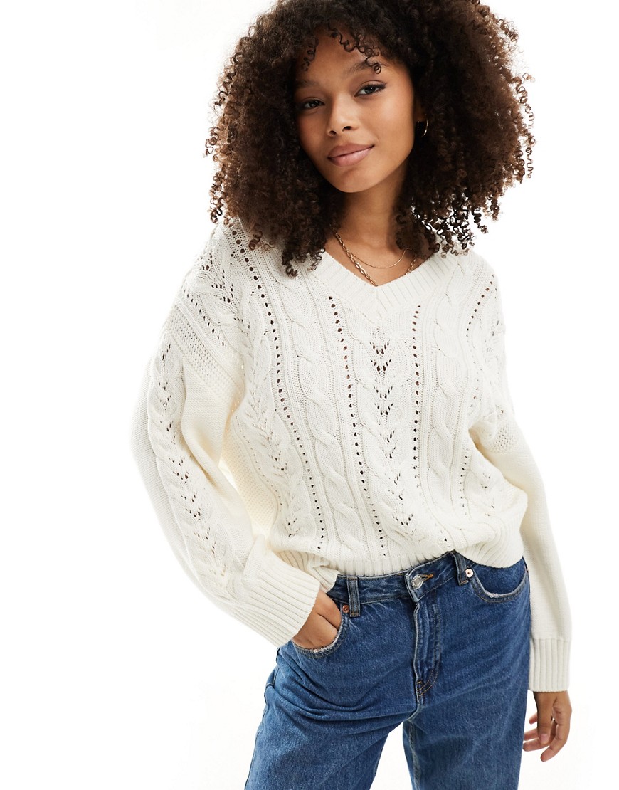v neck cable knit sweater in cream-White