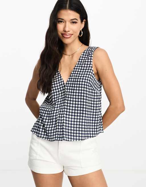 ASOS DESIGN v neck crinkle cami with popper front in navy gingham