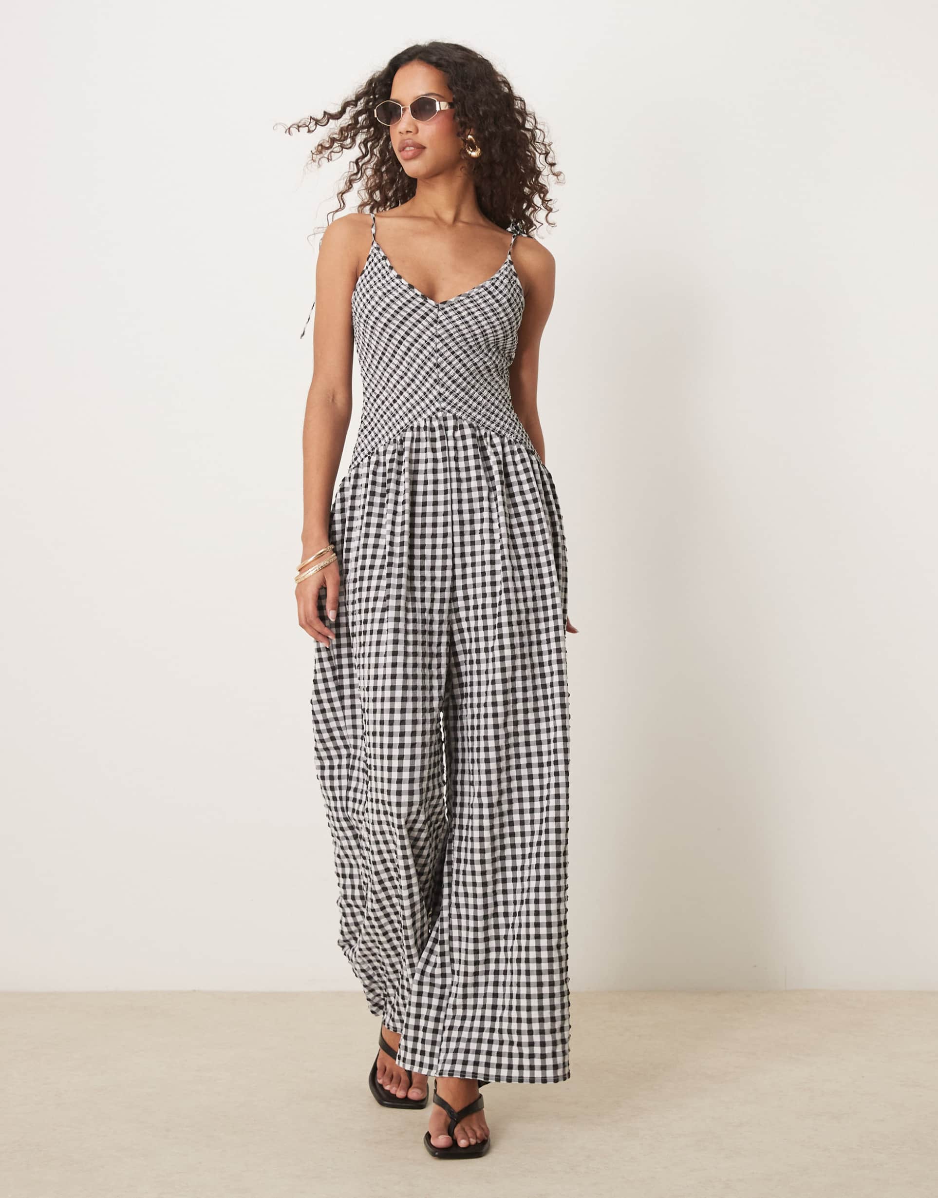 asos design v neck crinkle dropped waist jumpsuit in gingham