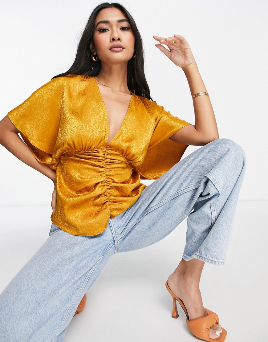 ASOS DESIGN v neck kimono top with gather and ring detail in gold