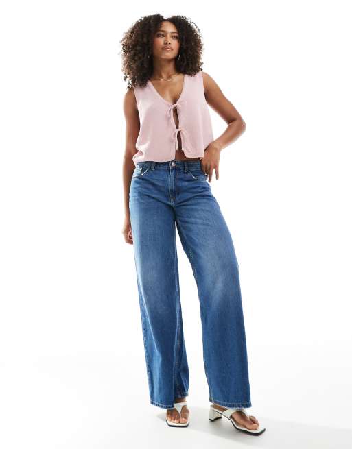 ASOS DESIGN v neck knit tank top with bow tie front in pink