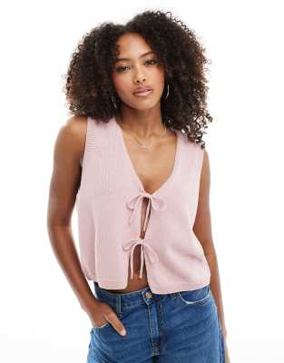 ASOS DESIGN v neck knitted tank top with bow tie front in pink