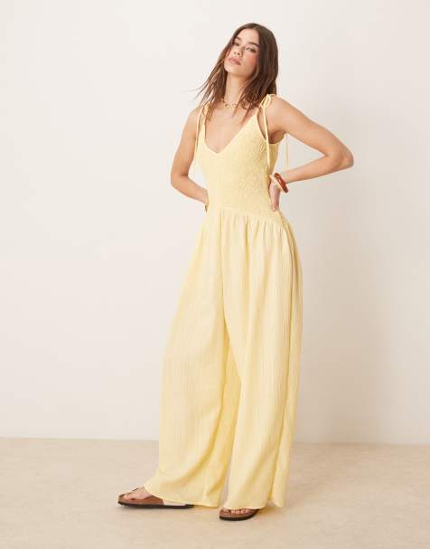 ASOS DESIGN V neck poly crinkle dropped waist jumpsuit in lemon yellow - view 1
