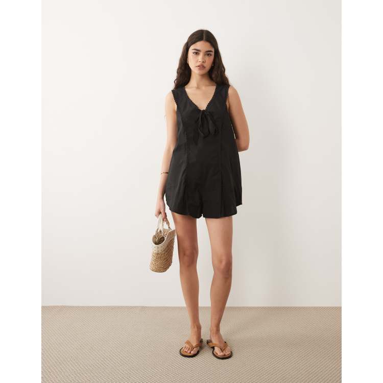 ASOS Design V-neck romper with lace trim in Black