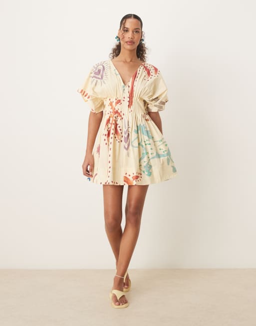 ASOS DESIGN v neck short sleeve mini dress with narrow pintucks in abstract print