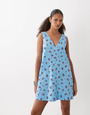 ASOS DESIGN v neck smock mini sundress in blue floral 