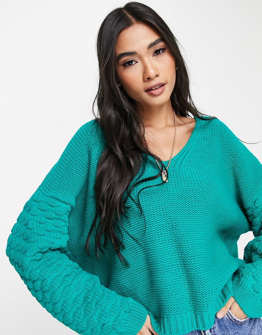 ASOS DESIGN V neck sweater with textured sleeve in green